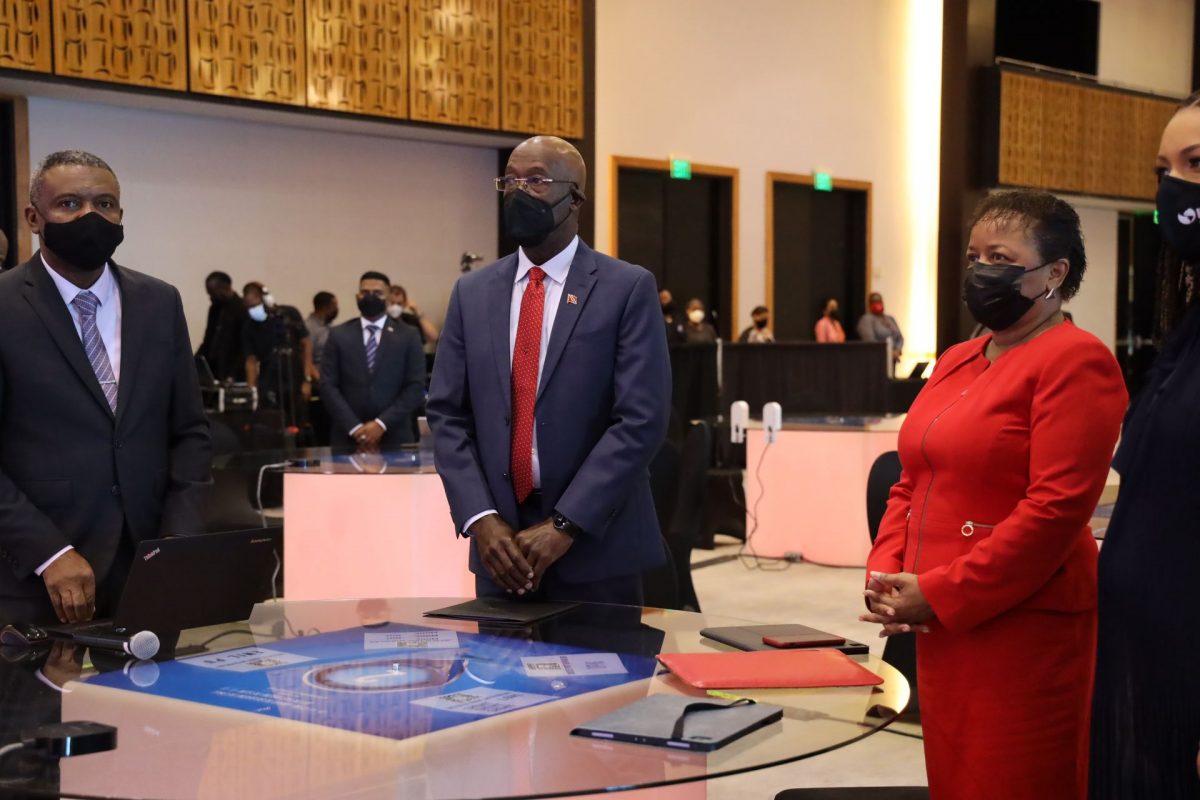 Digital Transformation Minister Hassel Bacchus, left, Prime Minister Dr Keith Rowley, centre, and Minister of Public Administration Allyson West, at the Public Service Leadership Digital Transformation workshop held at the HYATT Regency Hotel, Port-of-Spain, yesterday.