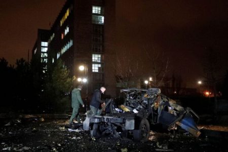 A view shows a wreckage of a car that, according to the local authorities, was blown up near the government building, in the rebel-controlled city of Donetsk, Ukraine February 18, 2022. REUTERS/Alexander Ermochenko