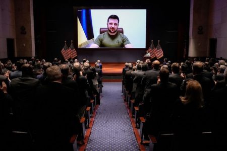 Ukrainian President Volodymyr Zelenskiy delivers a video address to senators and members of the House of Representatives gathered in the Capitol Visitor Center Congressional Auditorium, at the U.S. Capitol in Washington, U.S., March 16, 2022. Drew Angerer/Pool via REUTERS