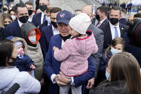 President Joe Biden meets with Ukrainian refugees and humanitarian aid workers during a visit to PGE Narodowy Stadium, Saturday, March 26, 2022, in Warsaw. (AP Photo/Evan Vucci)