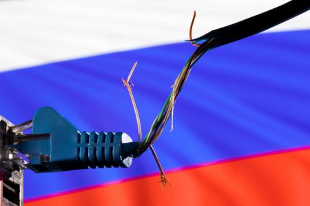 FILE PHOTO: Broken Ethernet cable is seen in front of Russian flag colors in this illustration taken March 8, 2022. REUTERS/Dado Ruvic/Illustration
