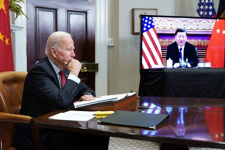 Joe Biden meets virtually with Xi Jinping from the Roosevelt Room of the White House in Washington. 