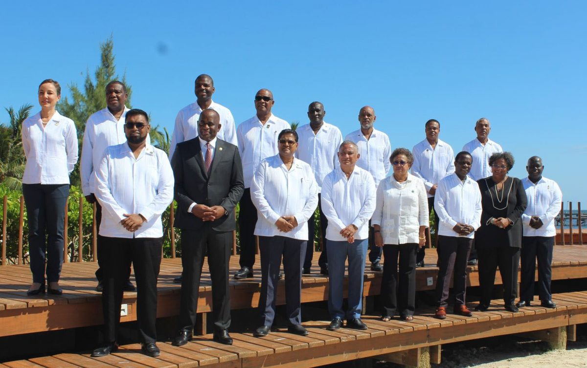 Participants at the recently ended summit. In front row (l-r) are:  Irfaan Ali, President, Guyana; Roosevelt Skerrit, Prime Minister, Dominica;  Chandrikapersad Santokhi, President, Suriname; Chairman, Prime Minister John Antonio Briceño, Belize; Secretary-General, CARICOM, Dr Carla Barnett; Dr Keith Mitchell, Prime Minister, Grenada;  Mia Mottley, Prime Minister, Barbados; and Phillip Davis, Prime Minister, The Bahamas. In back row are (l-r): Kamina Johnson-Smith, Foreign Minister, Jamaica;  Alva Baptiste, Foreign Minister, Saint Lucia;  Natalio Wheatley, Deputy Premier, British Virgin Islands;   Charles Washington Misick, Premier, Turks and Caicos Islands;  Joseph E. Farrell, Premier, Montserrat,  E. Ariel Henry, Acting President and Prime Minister, Haiti; Senator Dr Amery Browne, Foreign Minister, Trinidad and Tobago; and Montgomery Daniel, Deputy Prime Minister, St. Vincent and the Grenadines (CARICOM photo)