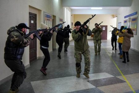 Civilians who volunteered to join the Territorial Defence Forces train on weapons in Odessa, Ukraine, March 11, 2022. REUTERS/Alexandros Avramidis