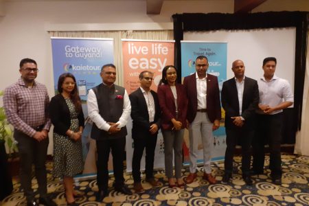 Founder of Kaietour, Salaudeen Nausrudeen (fourth, from left), with Minister of Tourism, Industry and Commerce Oneidge Walrond (fifth, from left) and other attendees at the launch 