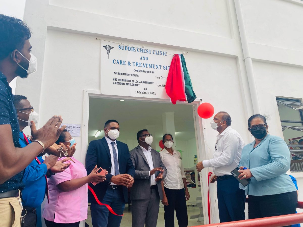 The ribbon is cut to commission the new $30 million infectious disease building at the Suddie Public Hospital. Among those in photo are Minister of Health Dr Frank Anthony (second from right), Minister of Local Government and Regional Development Nigel Dharamlall (fourth from left), Region Two Chairperson Vilma De Silva (at right), Regional Health Officer Dr Ranjeev Singh (fourth from right) and staff members