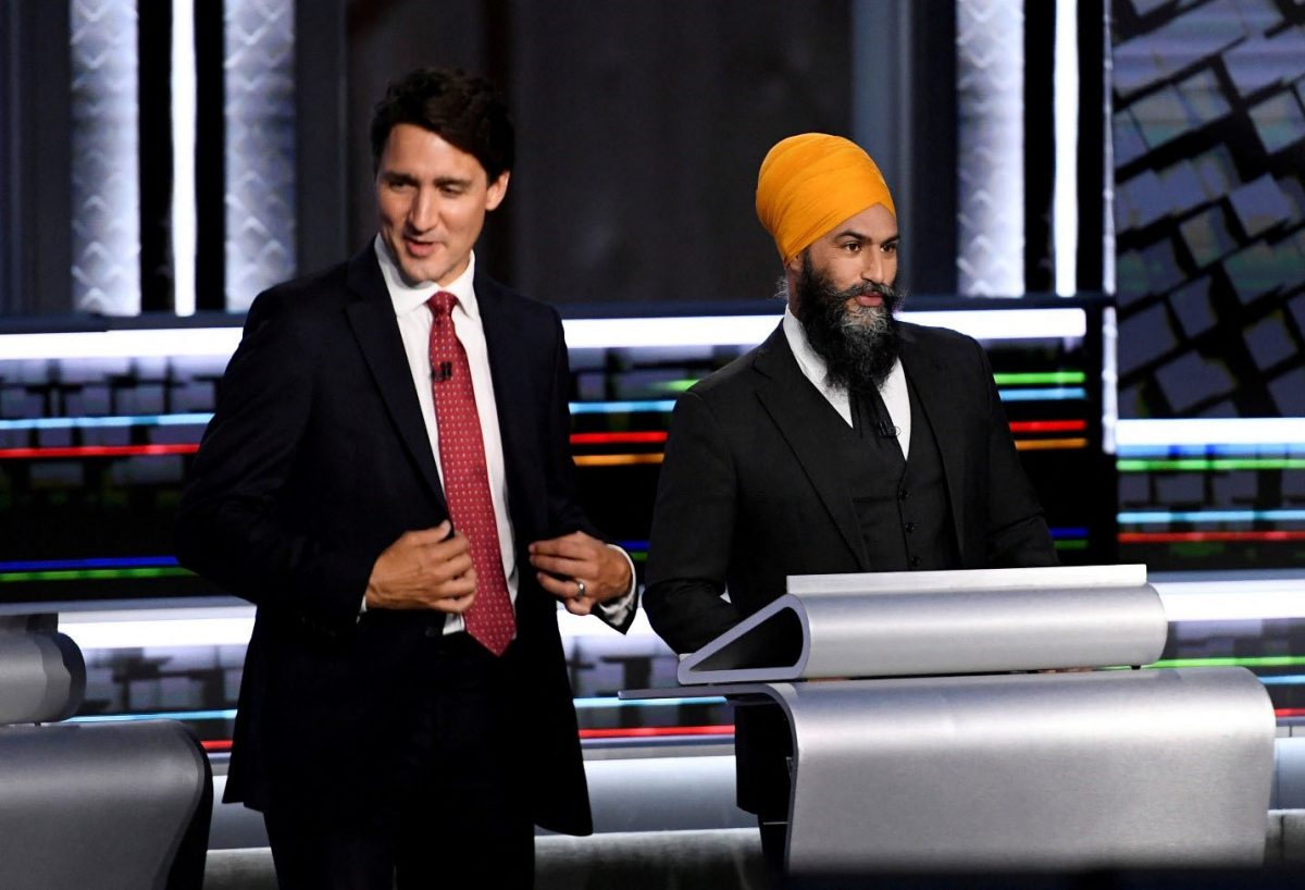 Liberal Leader Justin Trudeau (left) and NDP Leader Jagmeet Singh take part in the federal election English-language Leaders debate in Gatineau, Canada, September 9, 2021. Justin Tang/Pool via REUTERS/File Photo
