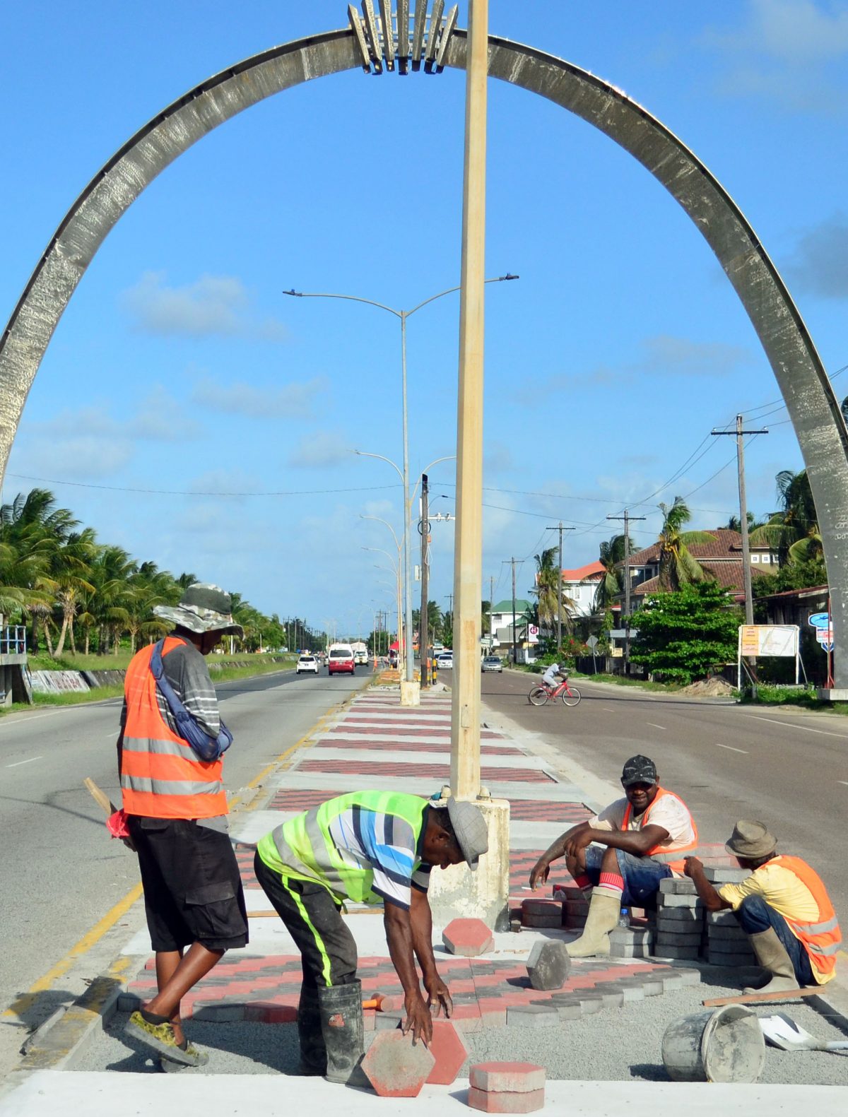 The median along the Rupert Craig Highway on the East Coast of Demerara being paved yesterday. (Orlando Charles photo) 