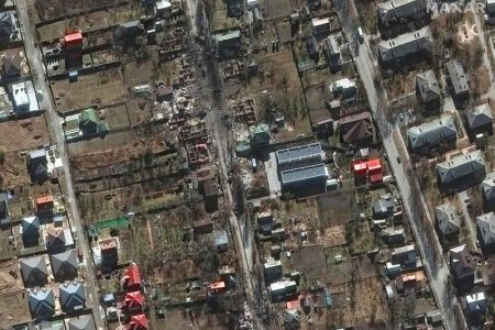 A satellite image shows destroyed military vehicles in a residential area and destroyed homes on Vokzalna Street, in Bucha, Ukraine, February 28, 2022. Maxar/via REUTERS