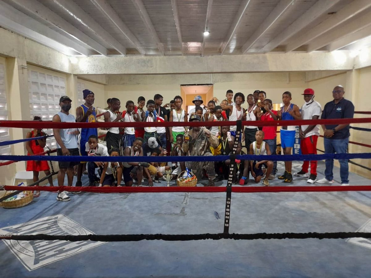 The principals and the combatants of the third Pepsi/Mike Parris U-16 Tournament for 2022 which was staged on Saturday at the Andrew ‘Sixhead’ Lewis Gym pose for a photo following the fixture.
