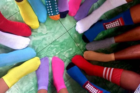 Children from Santa Rosa Primary School wear mismatched socks in recognition of World Down Syndrome Day, which was observed last Monday. (Ministry of Education photo)