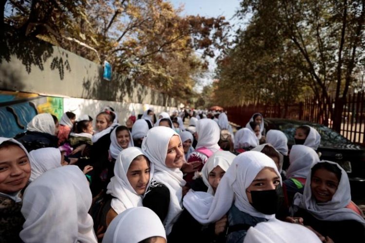 Female students leave school after a class in Kabul, Afghanistan, on Oct 25, 2021. PHOTO: REUTERS