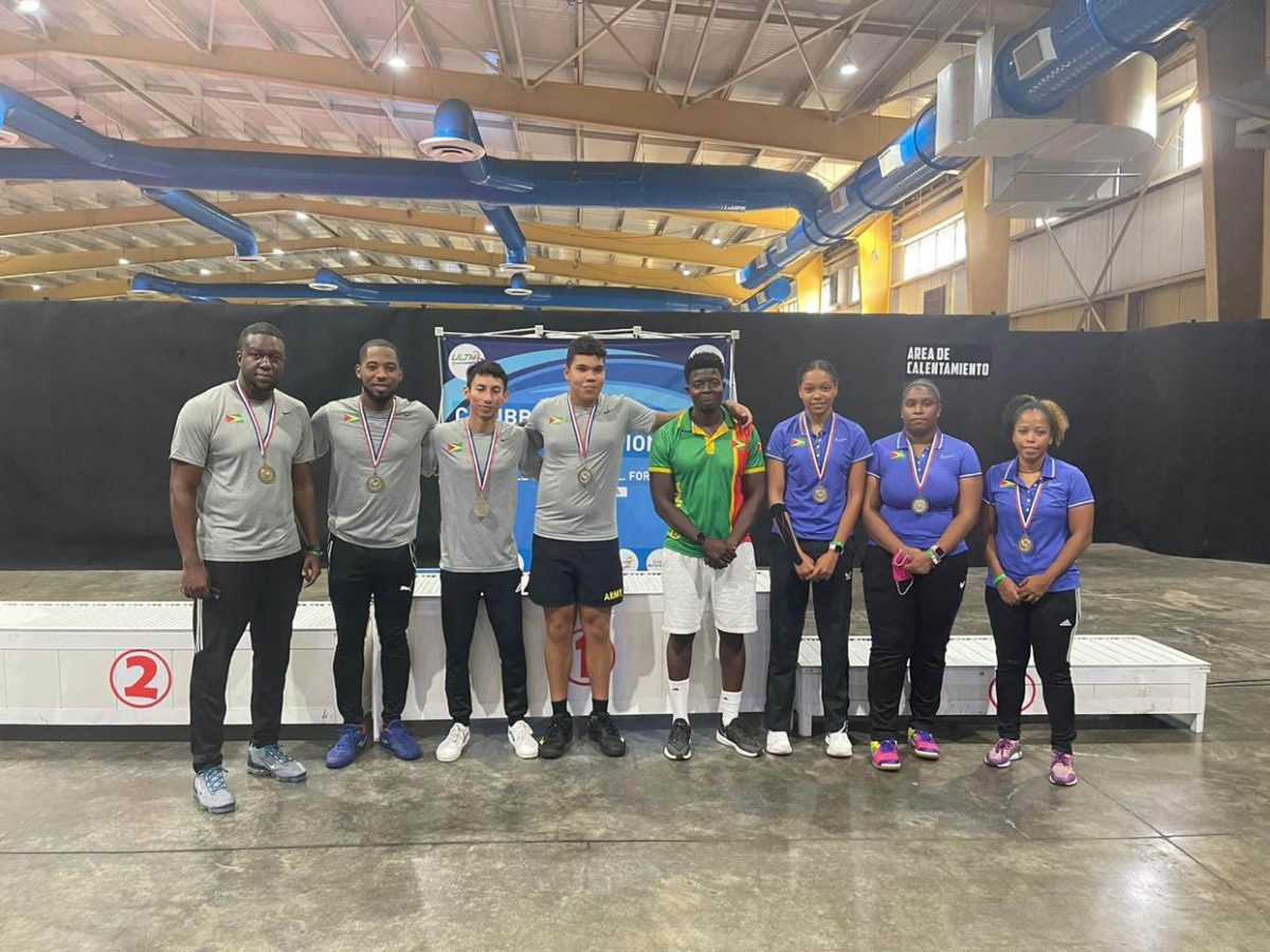 Guyana male and female teams which won bronze medals at this year’s Caribbean Table Tennis Championships in Cuba earlier this month

