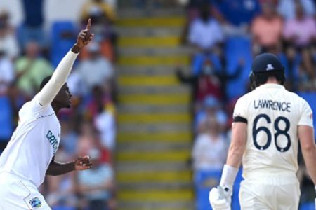 Jason Holder celebrates the wicket of Dan Lawrence for 20 on yesterday’s opening day of the first Test.
