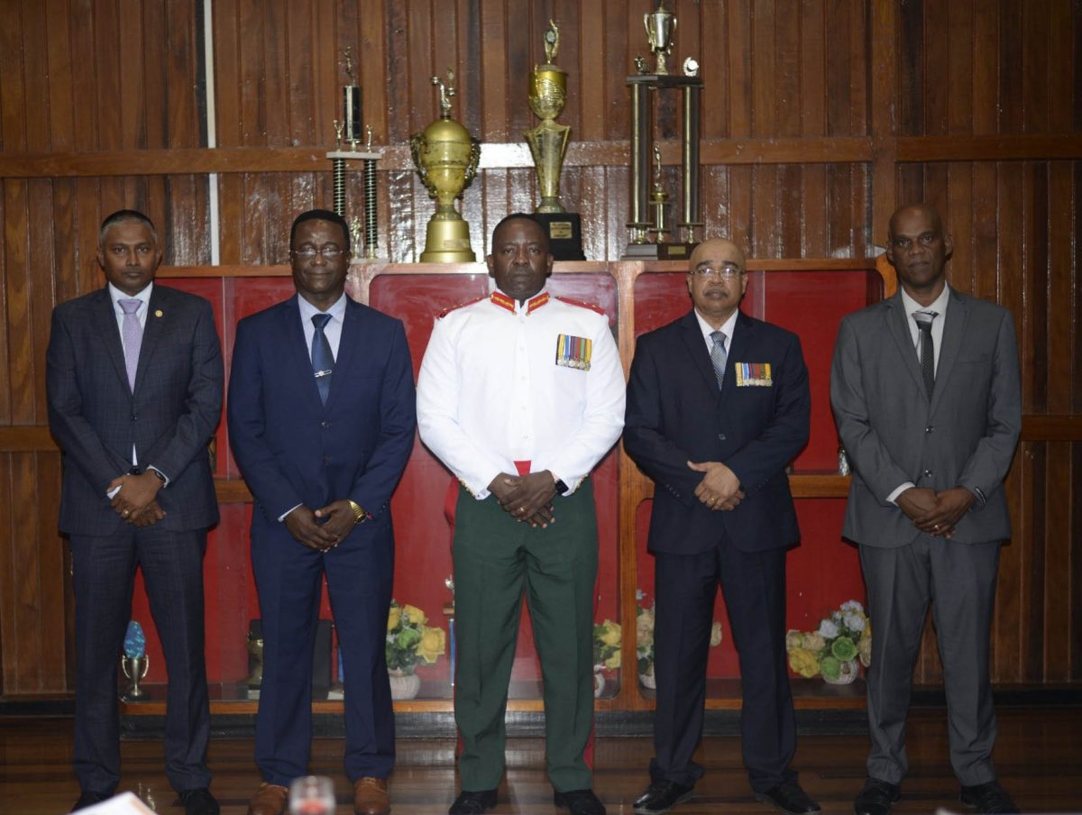 The Guyana Defence Force on Tuesday evening hosted a traditional “Dining out” dinner for four of its recently retired Officers.
The former Officers honoured were Colonel (Ret’d) Jawahar Persaud (second from right), Lieutenant Colonel (Ret’d) Dwain Jervis (second from left) and Majors (Ret’d) Roderick Leitch (right) and Bhageshwar Murli (left).
The event was held at the Officers’ Mess, Base Camp Ayanganna, a release from the GDF said.
Chief of Staff Brigadier Godfrey Bess (centre), Colonel General Staff, Colonel Julius Skeete, Director National Intelligence and Security Agency, Colonel Omar Khan and Other Senior Officers were also present, the release added. (GDF photo)