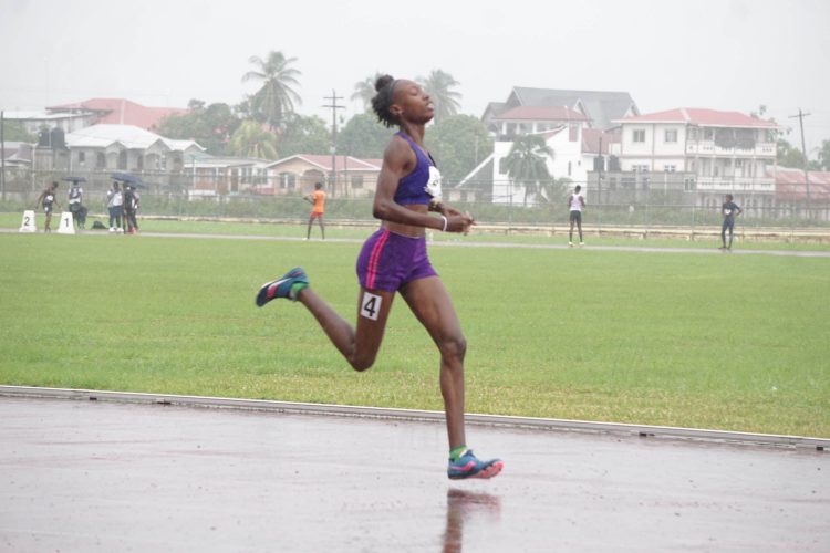 Naris McPherson is caught in stride during her win yesterday.  (Emmerson Campbell photo)