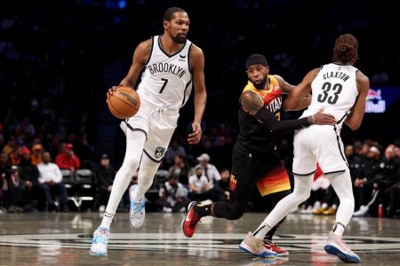 Brooklyn Nets forward Kevin Durant (7) controls the ball against Utah Jazz forward Royce O’Neale (23) as Nets forward Nic Claxton (33) sets a pick during the first quarter at Barclays Center. Mandatory Credit: Brad Penner-USA TODAY Sports