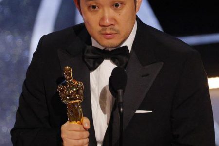 Director Ryusuke Hamaguchi accepts the Oscar for Best International Feature Film for “Drive My Car”. REUTERS/Brian Snyder