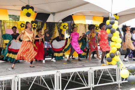 Queen’s College students during a cultural performance on Friday when the school celebrated being named the 2021 School of the Year for the region by the Caribbean Examinations Council (CXC) (Ministry of Education photo)