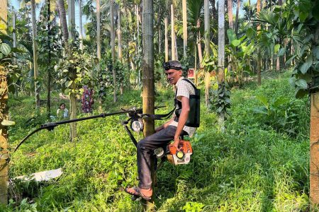 Ganapathi Bhat  on the scooter (Reuters photo)