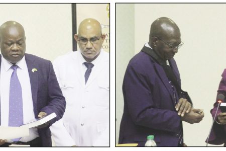 New Members of Parliament, Aubrey Norton (centre at left) and Volda Lawrence  (centre at right) taking the oath of office yesterday. (Orlando Charles photos)