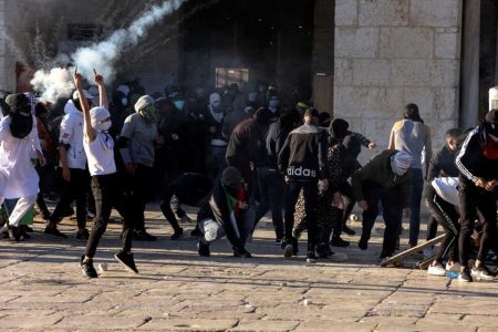 Palestinian protestors clash with Israeli security forces at the compound that houses Al-Aqsa Mosque, known to Muslims as Noble Sanctuary and to Jews as Temple Mount, in Jerusalem's Old City Apr 15, 2022. Reuters