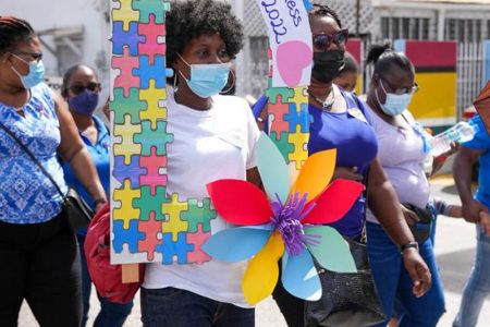 Participants in Friday’s Autism Walk, which was held to launch activities for Autism Acceptance Month (Ministry of Education photo)