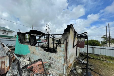The burnt remains of the house. (Guyana Fire Service photo)