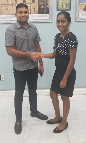 During a simple ceremony yesterday, Regina Persaud of the Athletic Association of Guyana (AAG), received an undisclosed sponsorship pact from Mohamed’s Enterprise, through its principal, Azruddin Mohamed.