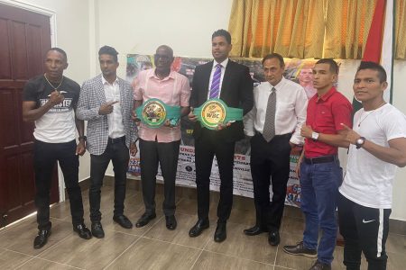 The combatants and principals of the ‘Road To Redemption’ fight card Saturday at the National Stadium recently posed for a photo at the Ministry of Sport on Main Street.
