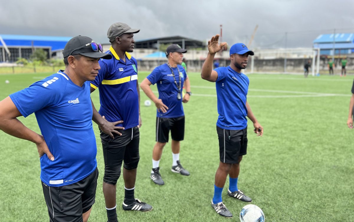 Head-coach Vurlon Mills of the Golden Jaguars U16 team, addressing the squad in the presence of several members of his squad at the National Training Centre, Providence.