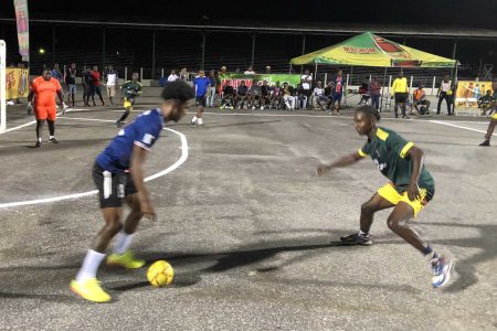 Scenes from the Sparta Boss (blue) and Alexander Village encounter on the opening night of the Magnum Independence Futsal Cup at the National Park tarmac