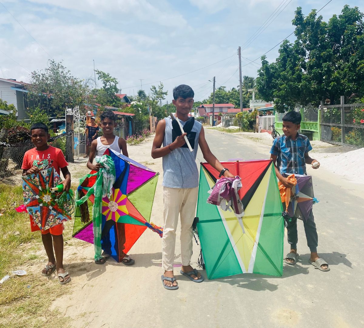 Children preparing to raise their kites