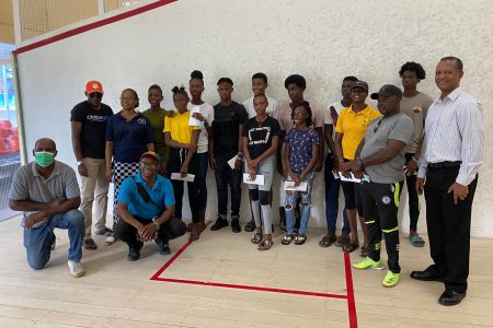 Members of the Guyana Committee of Service made presentations of tokens to each of the CARIFTA Games
athletes and Team Manager, Nadine Trotz prior to their departure today for Jamaica. (Emmerson Campbell photo)