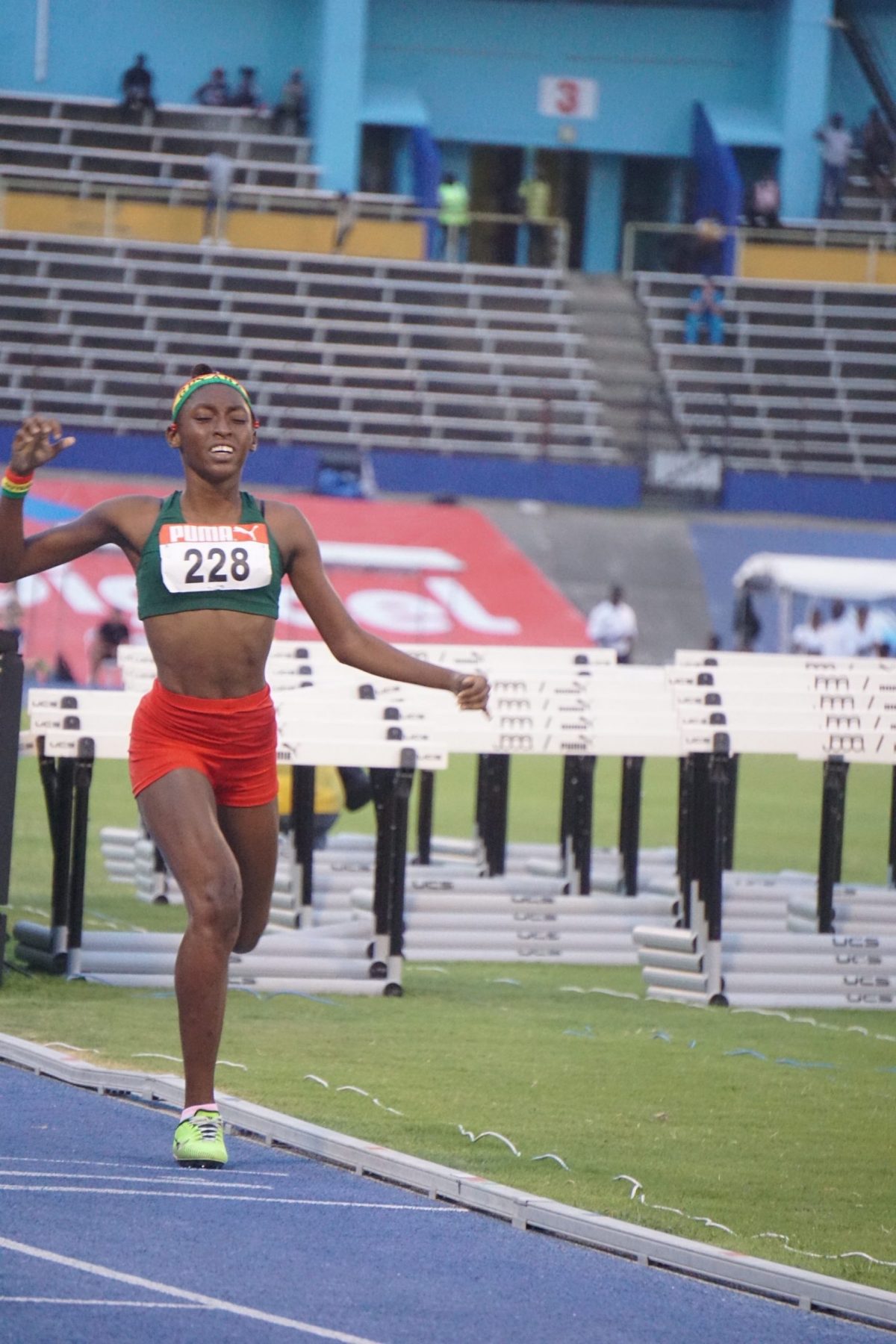 Golden Run! Attoya Harvey was all alone at the finish line in the Girls U-17 1500m final. (Emmerson Campbell photo)