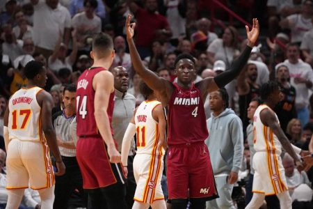 Miami Heat guard Victor Oladipo (4) reacts during the second half in game five of the first round for the 2022 NBA playoffs against the Miami Heat at FTX Arena Tuesday night. Mandatory Credit: Jasen Vinlove-USA TODAY Sports