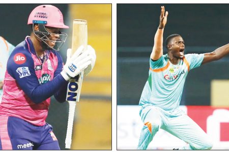 Shimron Hetmyer, left, got the better of his West Indian teammate Jason Holder yesterday hitting the bowler for 18 runs in one over as Hetmyer’s Rajasthan Royals defeated Holder’s Lucknow Super Giants by three runs to climb to the top of the Indian Premier League standings.