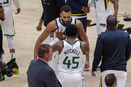 Utah Jazz guard Donovan Mitchell (45) and center Rudy Gobert (27) celebrate after the game against the Dallas Mavericksin game four of the first round for the 2022 NBA playoffs at Vivint Arena. Utah Jazz won 100-00. Mandatory Credit: Chris Nicoll-USA TODAY Sports