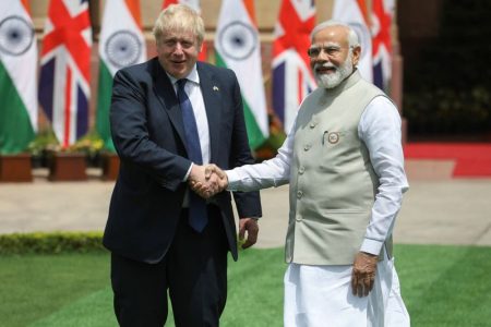 British Prime Minister Boris Johnson and Indian Prime Minister Narendra Modi pose for a photo before a meeting, at Hyderabad House in New Delhi, India, April 22, 2022. REUTERS/Altaf Hussain