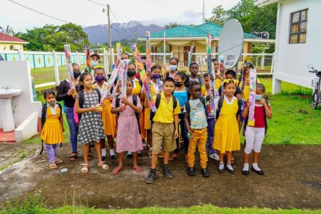 Mahdia children with kites distributed yesterday by Minister of Human Services and Social Security, Dr. Vindhya Persaud. (Ministry of Human Services photo)