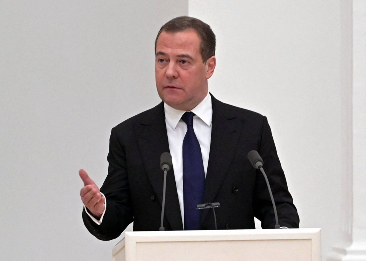 Deputy chairman of the Russian Security Council Dmitry Medvedev speaks during a meeting with members of the Security Council in Moscow on February 21, 2022.  (Photo by Alexey NIKOLSKY / Sputnik / AFP)