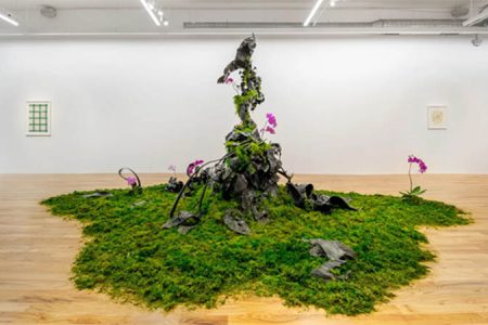 Monument by Regan Rosberg combines black plastic with moss and orchids to startling effect (Credit: Weinberg/Newton Gallery, Chicago, IL. Photography by Evan Jenkins)
