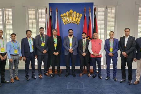 President Irfaan Ali (sixth from left) yesterday met with a team of Indian investors at State House.
The team was accompanied by Indian High Commissioner to Guyana, Dr K J Srinivasa (eighth from left) and was led by legendary Indian cricketer Kapil Dev (fifth from left), who is also the Chairman of the Dev Group of Companies.
A release from the Office of the President said that the team also included Dr Ajeenkya Patil, Chairman of the Ajeenkya D Y Patil Group; Chinta Sasidhar, Chairman of the Viswa Samudra Group and owner of the Krishnapatnam Port; Rajesh Puri, CEO of Dev Features Pvt Ltd and other directors and CEOs of reputable Indian companies. (Office of the President photo)