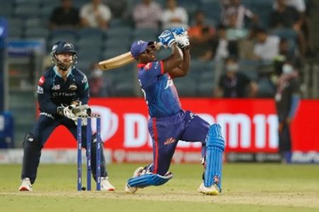 Rovman Powell hits out during his 20 against Gujarat Titans yesterday. (Photo courtesy IPL Media)