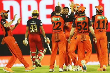 Sunrisers Hyderabad celebrate their nine wicket triumph over Virat Kohli’s Royal Challengers Bangalore yesterday.