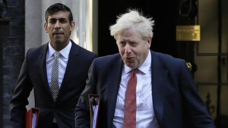 British Prime Minister Boris Johnson (right) and his finance minister Rishi Sunak