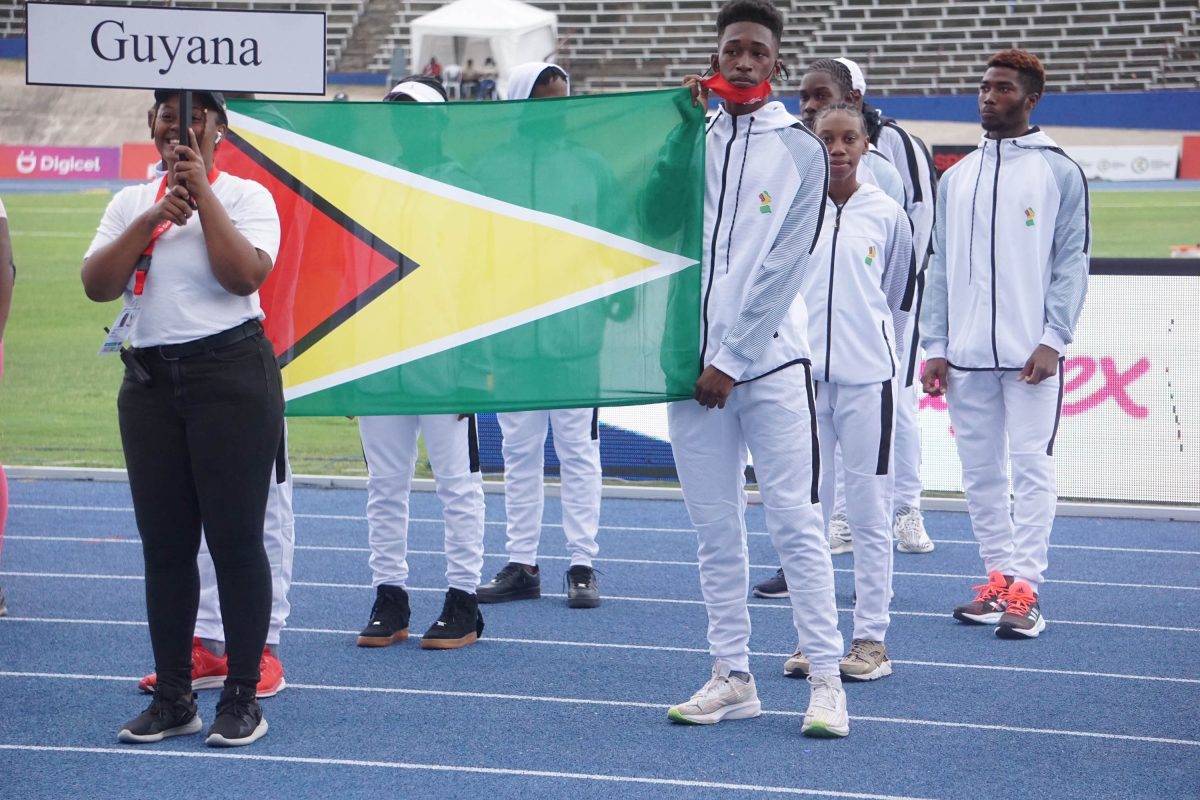 Some members of Team Guyana’s outfit standing on the track during the opening ceremony of this year’s edition of the CARIFTA Games being staged here in Kingston, Jamaica. (Emmerson Campbell photo)