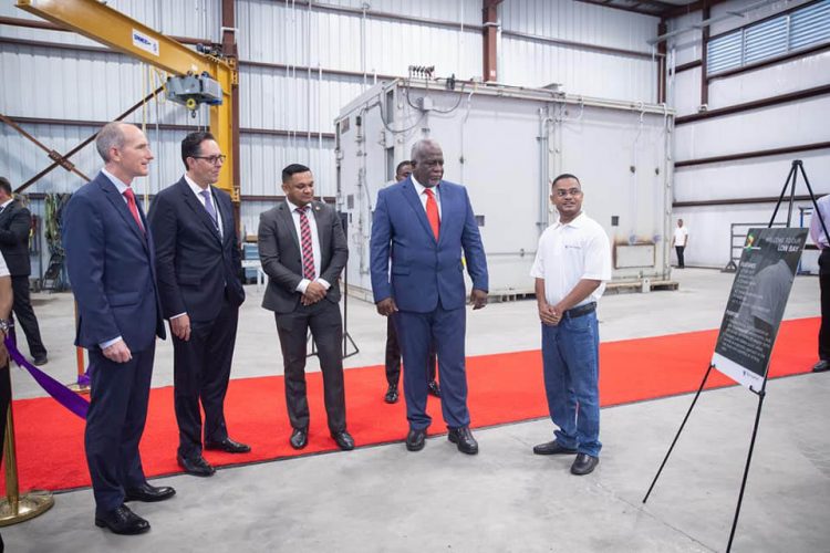 Prime Minister Mark Phillips (second from right) being given a tour of the facility. (Office of the Prime Minister photo)