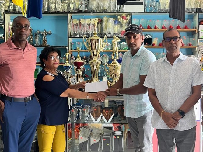Veronica Dhanraj hands over the sponsorship cheque to LGC Treasurer, Maxim `Danny’ Mangra. To his left is Ramesh Sunich and LGC Secretary, Chet Bowling. LGC vice president Paton George is to the right of Dhanraj.