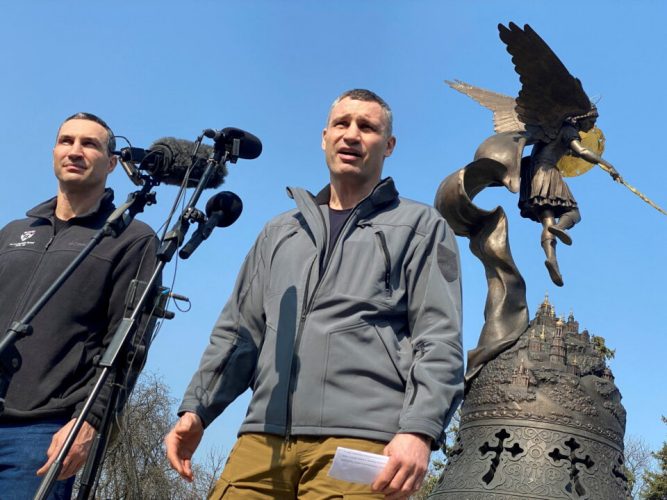 FILE PHOTO: Kyiv mayor and former heavyweight boxing champion Vitali Klitschko (right) and his brother Wladimir hold a press conference, as Russia's invasion of Ukraine continues, in Kyiv, Ukraine March 23, 2022. REUTERS/Sergiy Karazy/File Photo